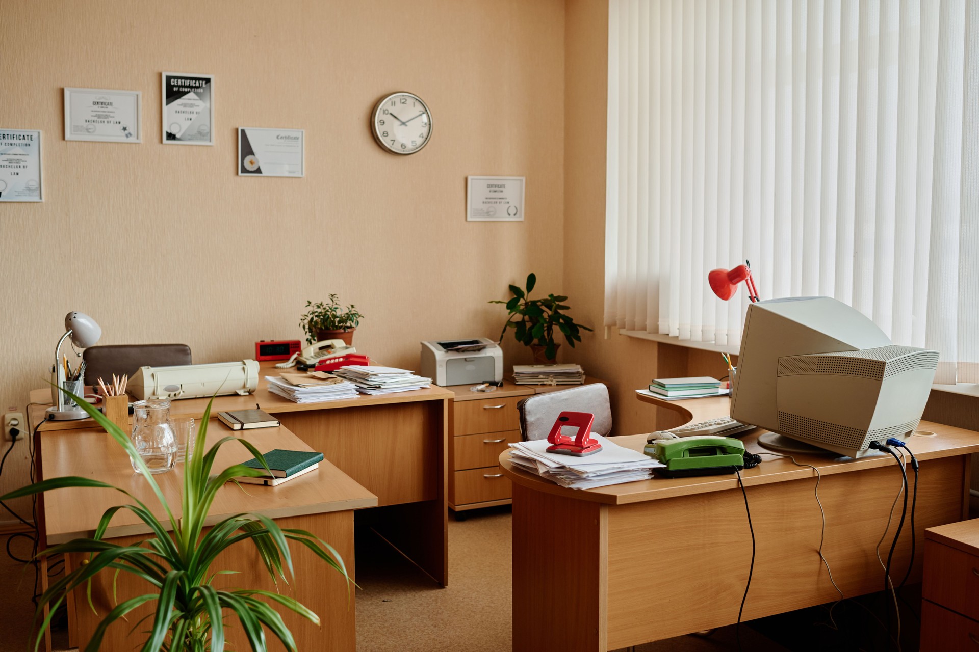 Busy Office Space Featuring Office Equipment and Plants